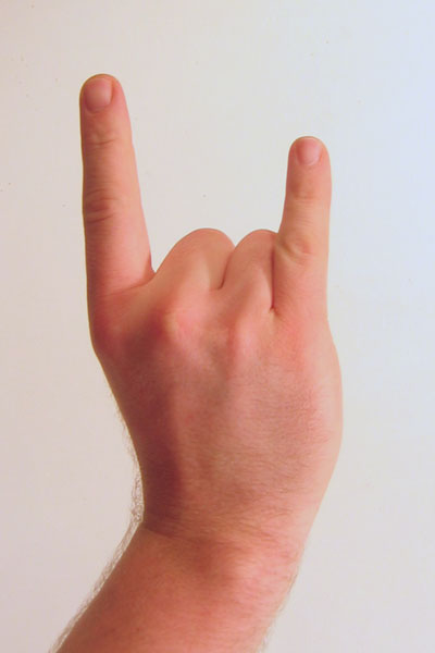 Gesture_raised_fist_with_index_and_pinky_lifted.jpg